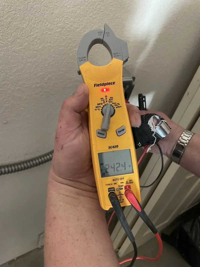 Voltage testing with clamp meter during Circuit Breaker Repair in Vassalboro